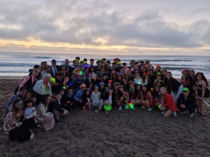 Fiesta de 15 en la playa con cotillón luminoso